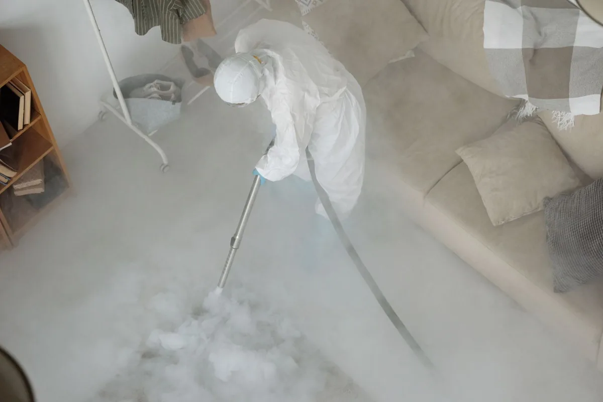 Biohazard cleanup technician in protective equipment, Baldwin, LA